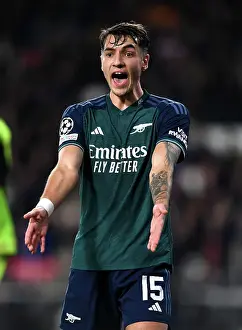 PSV Eindoven V Arsenal 2023-24 Prints: Arsenal's Jakub Kiwior Reacts During PSV Eindhoven Clash in 2023-24 UEFA Champions League