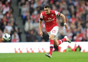 Manchester City V Arsenal 2012:13 Prints: Arsenal's Jenkinson Goes Head-to-Head with Manchester City in Premier League Clash (2012-13)