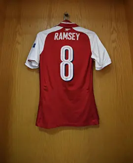 Arsenal V Atletico Madrid 2017-18 Prints: Arsenal's Empty Jersey: Aaron Ramsey's Absence in UEFA Europa League Semi-Final vs Atletico Madrid