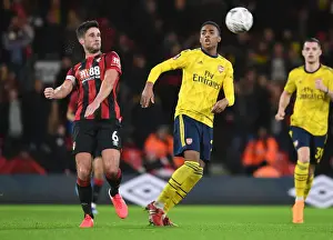 Arsenal's Joe Willock and Andrew Surman Clash in Intense FA Cup Fourth Round Match