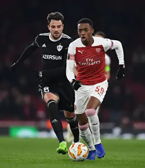 Arsenal V Qarabag 2018-19 Prints: Arsenal's Joe Willock Clashes with Michel in Europa League Match against Qarabag