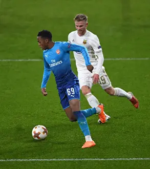 Arsenal V Östersunds FK 2017-18 Prints: Arsenal's Joe Willock Clashes with Östersunds Dennis Widgren in Europa League Showdown