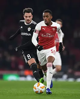 Arsenal V Qarabag 2018-19 Prints: Arsenal's Joe Willock Clashes with Qarabag's Michel in Europa League Showdown