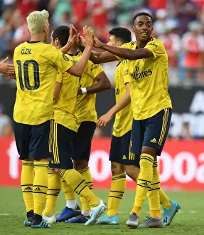 Arsenal's Joe Willock and Mesut Ozil Celebrate Goal Against ACF Fiorentina in 2019 International Champions Cup, Charlotte