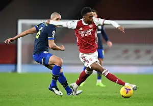 Arsenal V Southampton 2020-21 Prints: Arsenal's Joe Willock Outmaneuvers Oriol Romeu: Thrilling Moment from Arsenal vs Southampton (2020-21)