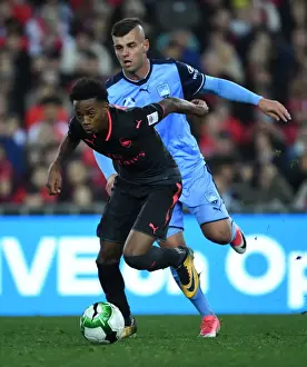 Sydney FC V Arsenal - 2017-18 Prints: Arsenal's Joe Willock Outshines Sydney FC's Christopher Zuvela: Young Gun's Agile Moves in Pre-Season Clash