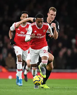 Arsenal's Joe Willock Outsmarts Dan Burn: A Premier League Battle at Emirates Stadium