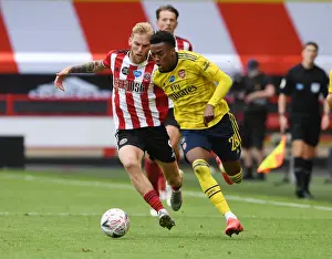 Sheffield United V Arsenal - FA Cup 2019-20 Prints: Arsenal's Joe Willock Powers Past Sheffield United's Olivier McBurnie in FA Cup Quarterfinal Showdown