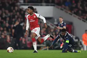 Arsenal V Red Star Belgrade 2017-18 Prints: Arsenal's Joe Willock vs. Mitchell Donald: Europa League Showdown at Emirates Stadium