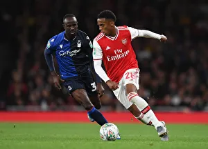 Arsenal's Joe Willock vs. Nottingham Forest's Albert Adomah: A Carabao Cup Battle at Emirates Stadium