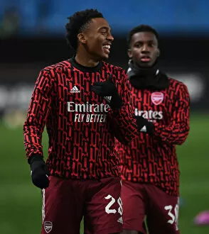 Images Dated 26th November 2020: Arsenal's Joe Willock Warming Up Ahead of Molde FK Clash in Europa League
