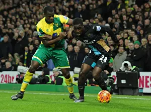 Norwich City V Arsenal 2015-16 Prints: Arsenal's Joel Campbell Fends Off Norwich Defender During Intense Premier League Showdown