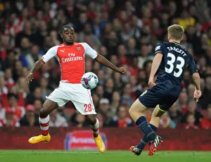 Arsenal V Southampton, League Cup 2014/15 Prints: Arsenal's Joel Campbell Fends Off Southampton's Matt Targett in Capital One Cup Clash
