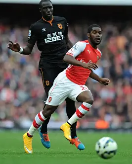 Arsenal V Hull City 2014-15 Prints: Arsenal's Joel Campbell Outmaneuvers Hull's Mohamed Diame