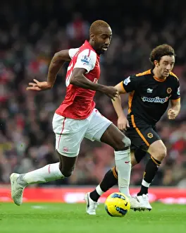 Arsenal V Wolverhampton Wanderers 2011-2012 Prints: Arsenal's Johan Djourou Breaks Past Wolverhampton's Stephen Hunt during the 2011-2012 Premier League Match