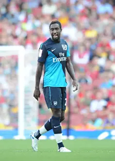 Arsenal V Boca Juniors 2011-12 Prints: Arsenal's Johan Djourou Faces Off Against Boca Juniors in the Emirates Cup
