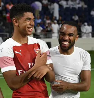 Al-Nasr Dubai SC V Arsenal 2018-19 Prints: Arsenal's John-Jules and Lacazette Celebrate Friendly Win Against Al-Nasr Dubai SC