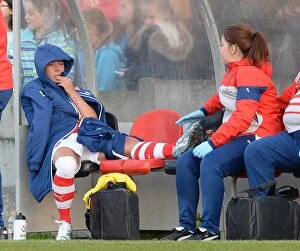 Chelsea Ladies v Arsenal Ladies 30/4/15 Collection: Arsenal's Jordan Nobbs Comforted by Physio After Suffering Injury Against Chelsea Ladies