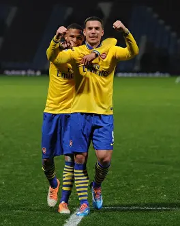 West Ham United V Arsenal 2013-14 Prints: Arsenal's Jubilant Podolski and Gibbs: Celebrating a Goal at West Ham United (2013-14)