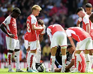 Arsenal V Nottingham Forest 2023-24 Prints: Arsenal's Jurrien Timber Receives Medical Attention During Arsenal vs Nottingham Forest (2023-24)