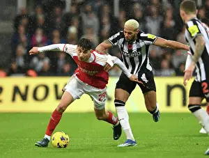 Arsenal's Kai Havertz Faces Off Against Newcastle's Joelinton in Premier League Clash (2023-24)