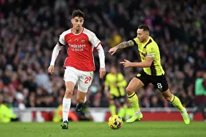 Arsenal's Kai Havertz Fights Past Burnley's Josh Brownhill in Premier League Clash (2023-24)