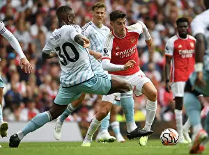 Arsenal's Kai Havertz Outmaneuvers Nottingham Forest's Willy Boly in 2023-24 Premier League Clash