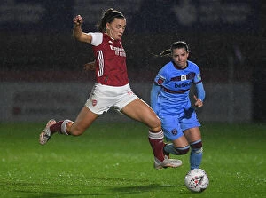 Images Dated 28th April 2021: Arsenal's Katie McCabe Battles for Possession in Empty FA WSL Match Against West Ham United