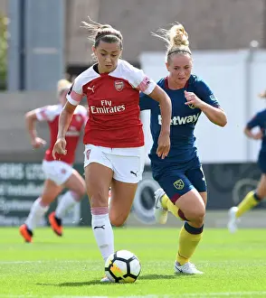 Arsenal's Katie McCabe Clashes with West Ham's Lucienne Reichardt in Continental Cup Match