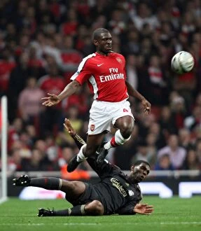 Arsenal v Liverpool - Carling Cup 2009-10 Collection: Arsenal's Kerrea Gilbert and Ryan Babel Clash in the Carling Cup: Arsenal 2