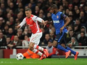Images Dated 25th February 2015: Arsenal's Kieran Gibbs Clashes with Monaco's Elderson in Champions League Showdown