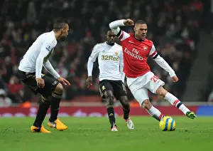 Arsenal's Kieran Gibbs Dashes Past Swansea's Defense in FA Cup Third Round Replay