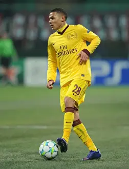 AC Milan V Arsenal 2011-12 Prints: Arsenal's Kieran Gibbs Faces Off Against AC Milan in the 2011-12 UEFA Champions League