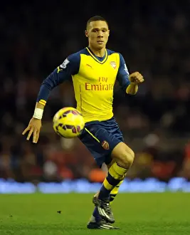 Liverpool V Arsenal 2014/15 Prints: Arsenal's Kieran Gibbs Faces Off Against Liverpool at Anfield (2014/15 Premier League)