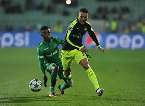 PFC Ludogorets Razgrad V Arsenal 2016-17 Prints: Arsenal's Kieran Gibbs Faces Off Against Ludogorets Jonathan Cafu in UEFA Champions League Clash