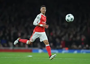 Arsenal V Paris Saint-Germain 2016-17 Prints: Arsenal's Kieran Gibbs Faces Off Against Paris Saint-Germain in the 2016-17 UEFA Champions League at Emirates