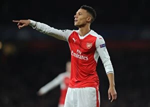Images Dated 23rd November 2016: Arsenal's Kieran Gibbs Goes Head-to-Head with Paris Saint-Germain in the 2016-17 UEFA Champions