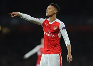 Arsenal V Paris Saint-Germain 2016-17 Prints: Arsenal's Kieran Gibbs Goes Head-to-Head with Paris Saint-Germain in the 2016-17 UEFA Champions League