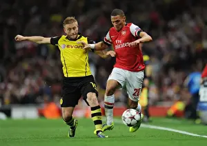 Arsenal V Borussia Dortmund 2013-14 Prints: Arsenal's Kieran Gibbs Outmaneuvers Borussia Dortmund's Jakub Blaszczykowski