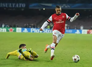 Napoli V Arsenal 2013-14 Prints: Arsenal's Kieran Gibbs Outmaneuvers Napoli's Dries Mertens in UEFA Champions League Clash