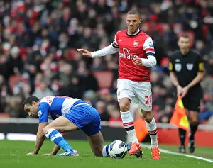 Arsenal's Kieran Gibbs Outmaneuvers Reading's Hal Robson-Kanu during the 2012-13 Premier League Match