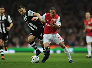 Arsenal V Newcastle United 2011-12 Prints: Arsenal's Kieran Gibbs Outsmarts Yohan Cabaye: A Premier League Showdown (2011-12)