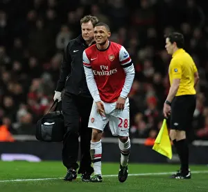 Arsenal V Liverpool 2012-13 Prints: Arsenal's Kieran Gibbs Receives Treatment from Physio Colin Lewin during Arsenal v Liverpool Match