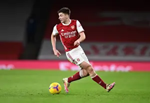 Arsenal's Kieran Tierney in Action: A Battle at Empty Emirates Against Newcastle United (2020-21)