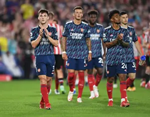 Brentford V Arsenal 2021-22 Prints: Arsenal's Kieran Tierney Celebrates with Fans after Brentford Victory