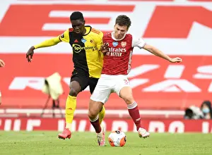 Arsenal's Kieran Tierney Clashes with Ismaila Sarr in Intense Premier League Face-off