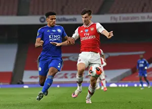Arsenal V Leicester City 2019-20 Prints: Arsenal's Kieran Tierney Clashes with Leicester's James Justin in Premier League Showdown