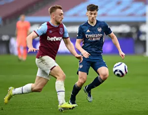 West Ham United V Arsenal 2020-21 Prints: Arsenal's Kieran Tierney Closes In on West Ham's Jarrod Bowen in Intense Premier League Clash