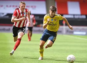 Arsenal's Kieran Tierney Faces Off Against John Lundstram in FA Cup Quarterfinal Clash