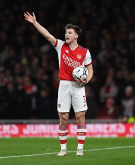Arsenal v Liverpool Carabao Cup 2021-22 Collection: Arsenal's Kieran Tierney Faces Off Against Liverpool in Carabao Cup Semi-Final Showdown
